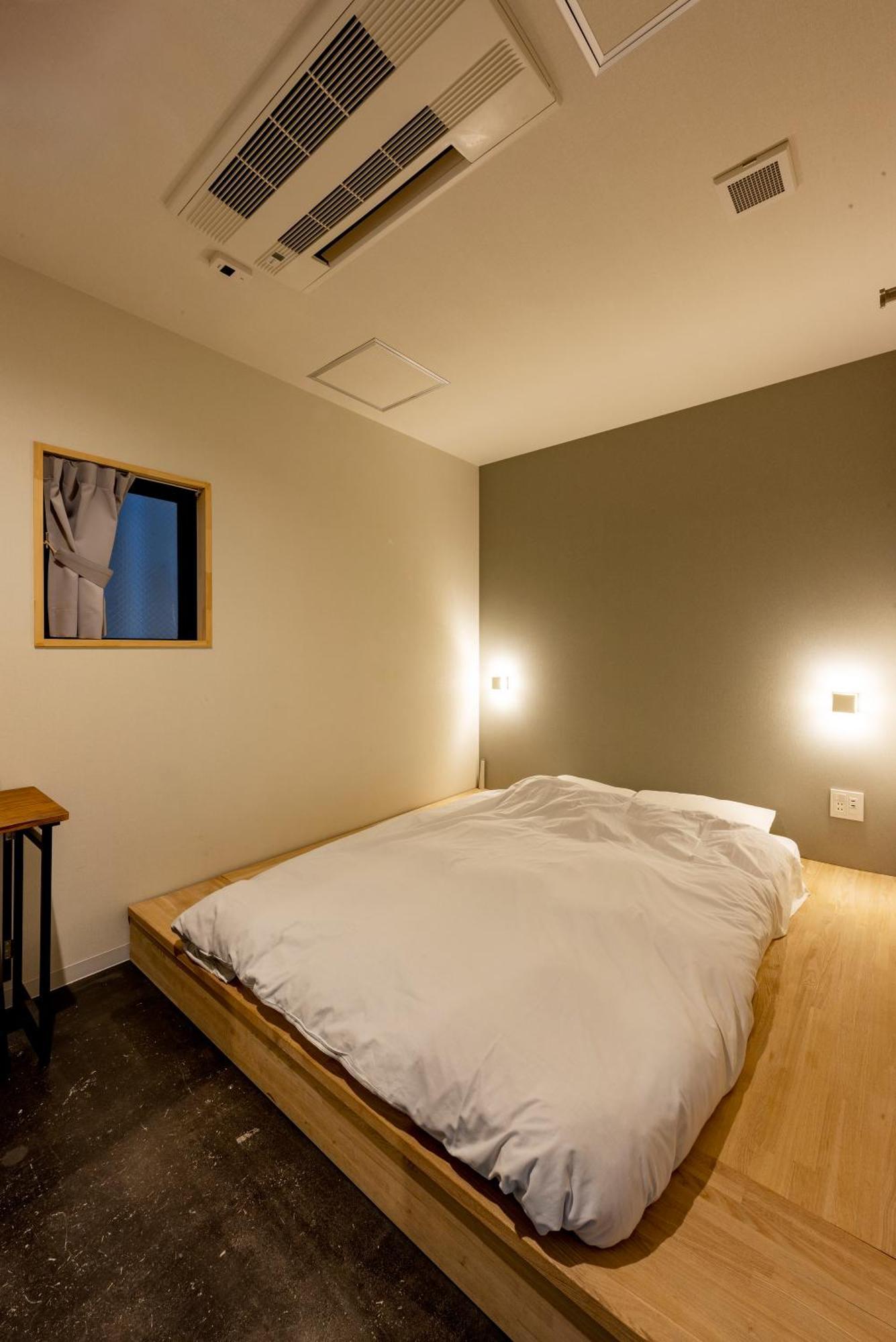 plat hostel keikyu minowa forest Tokyo Rom bilde